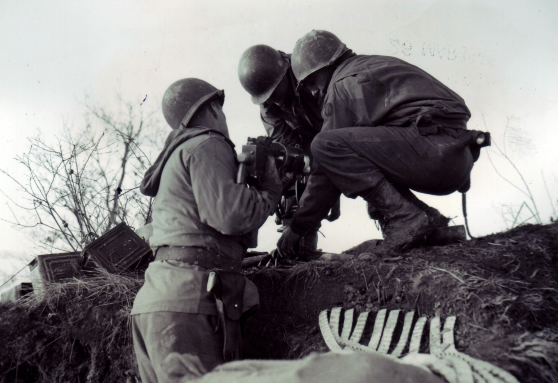 The “heavy Browning”: Moving a complete M1917 MG took several men to carry the 100+ pound combination of the gun (with water), tripod, and basic load of ammunition. Italy, February 1945