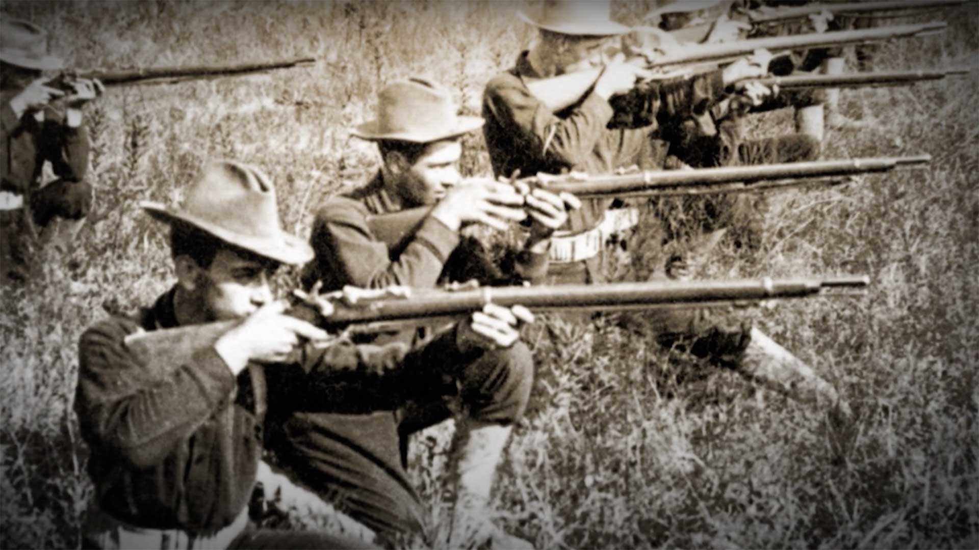 U.S. troops armed with the Springfield Model 1873 "Trap-Door" breech-loading rifle.