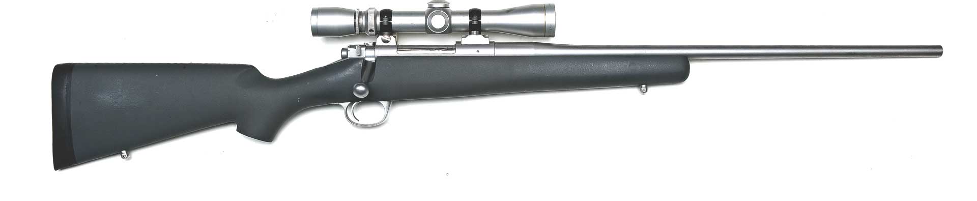 right-side view on white of Kimber 84M Montana stainless steel bolt-action rifle black stock