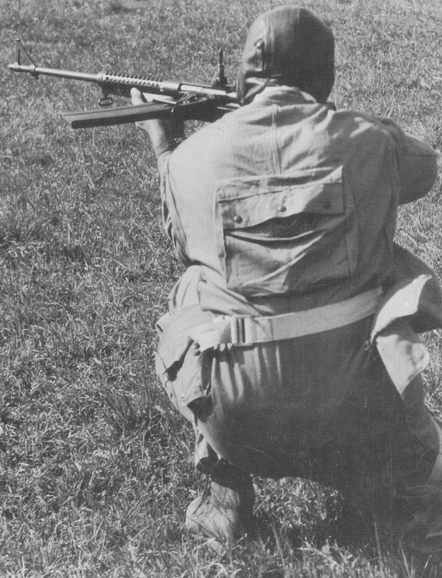 soldier shooting kneeling outdoors rifle gun marksman training
