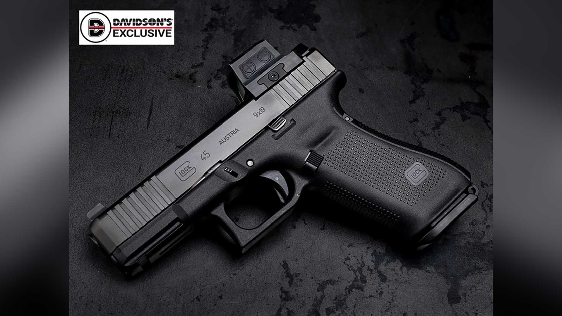 The Gunsite Glock Service Pistol's left side shown while lying on a black background.