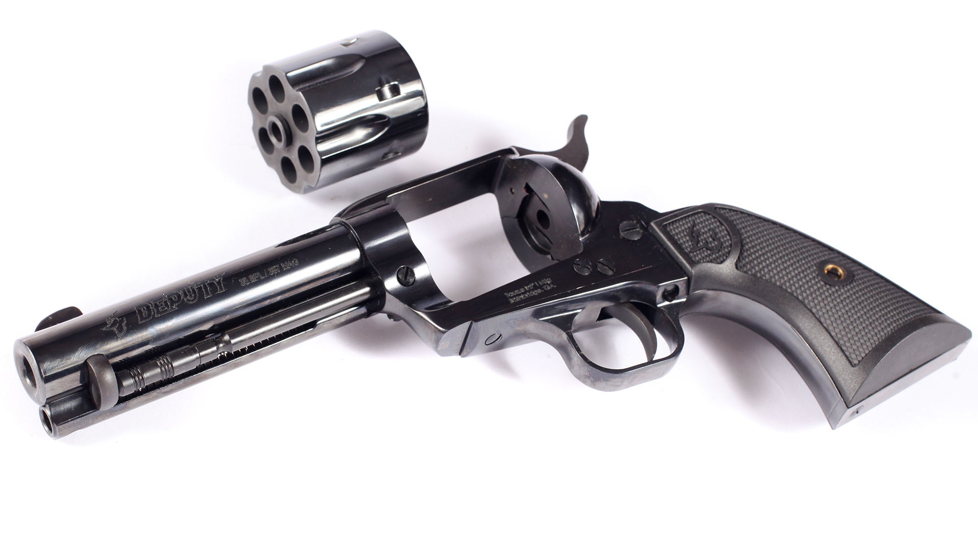 Taurus Deputy single-action revolver on its side with cylinder removed