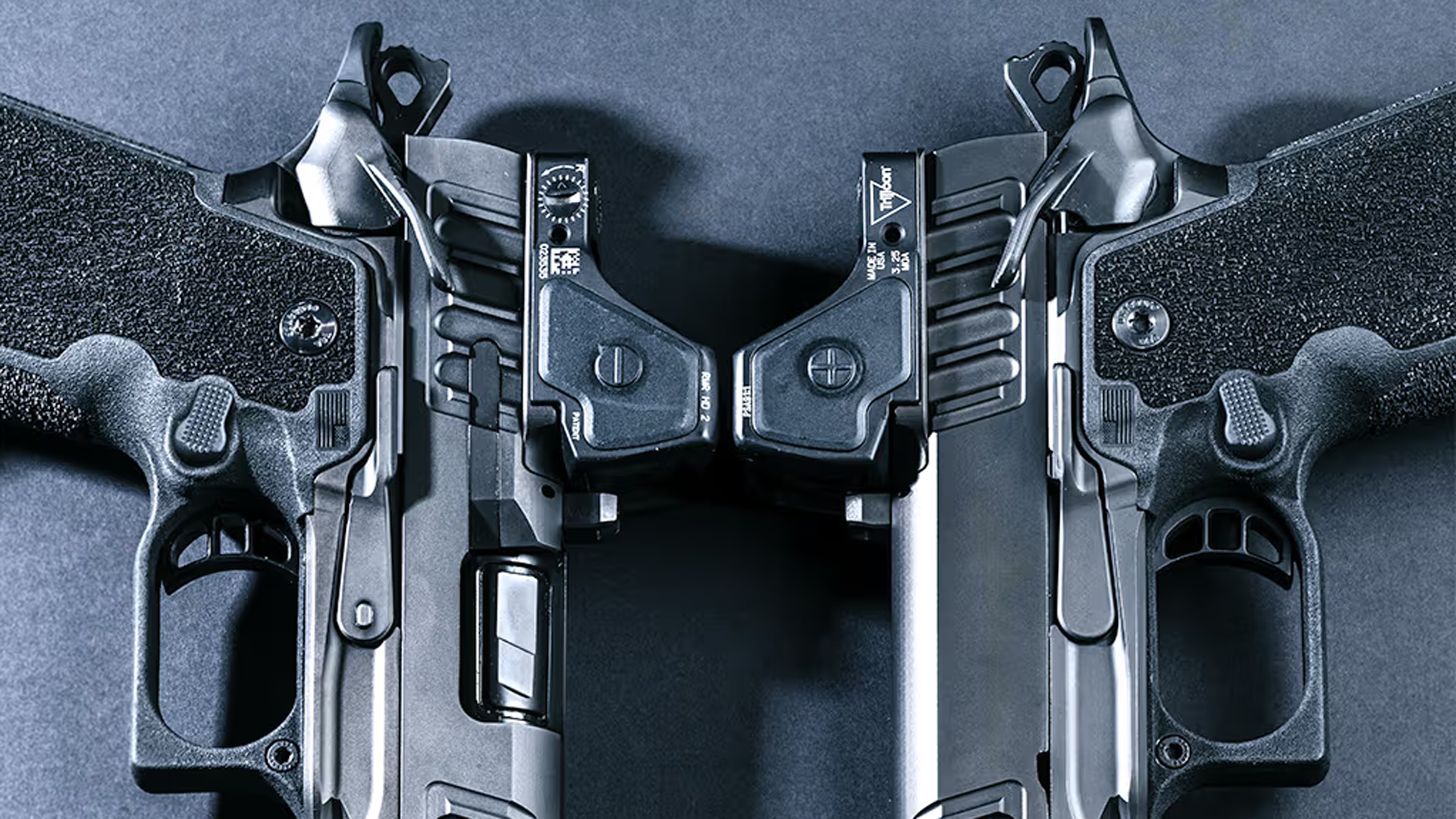 Two Staccato HD handguns shown with mounted Trijicon red-dot optics.