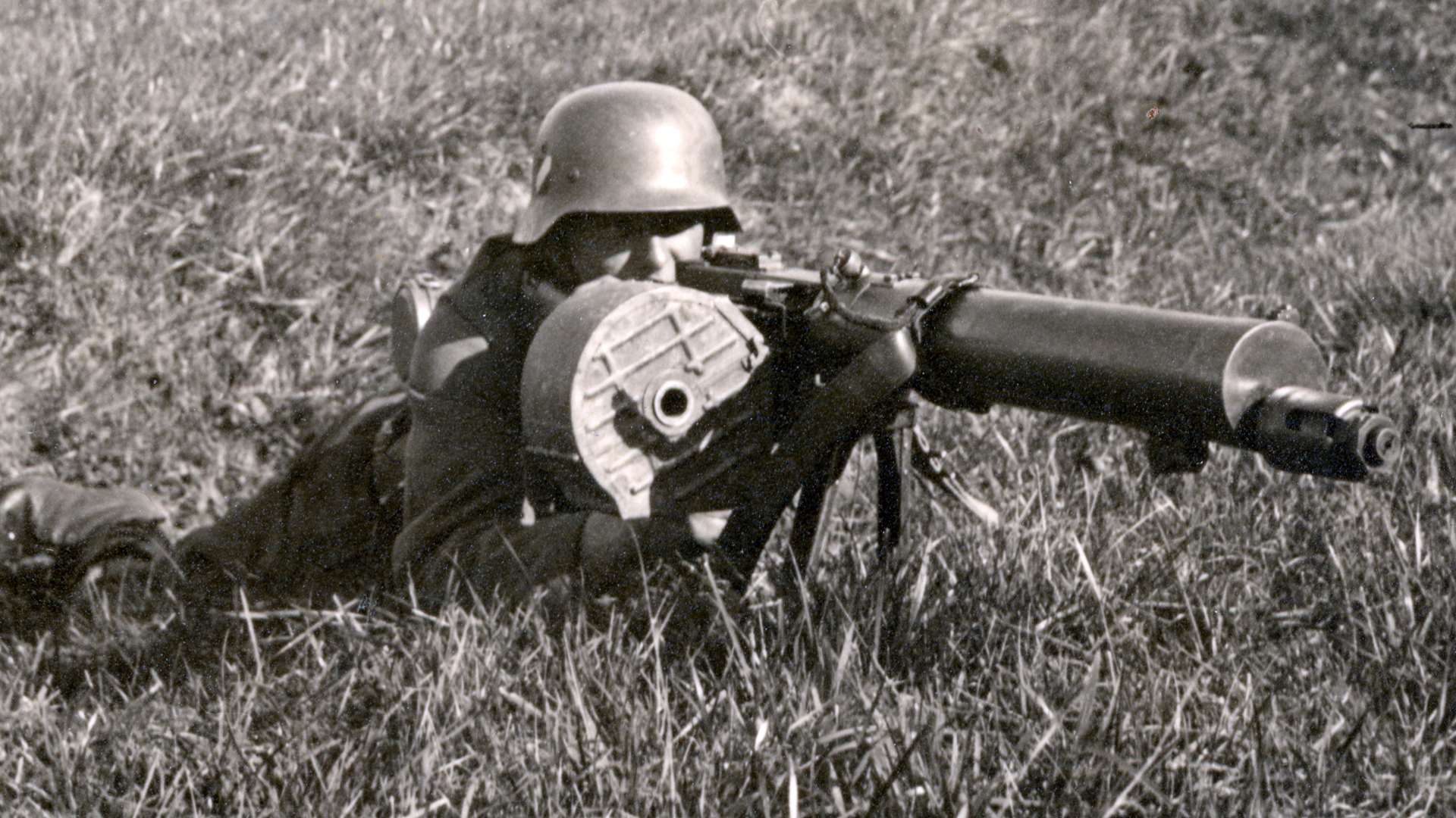 The great bulk of the MG08/15 with its 100-round ammunition belt drum is seen during training exercises in 1939.  Author’s collection