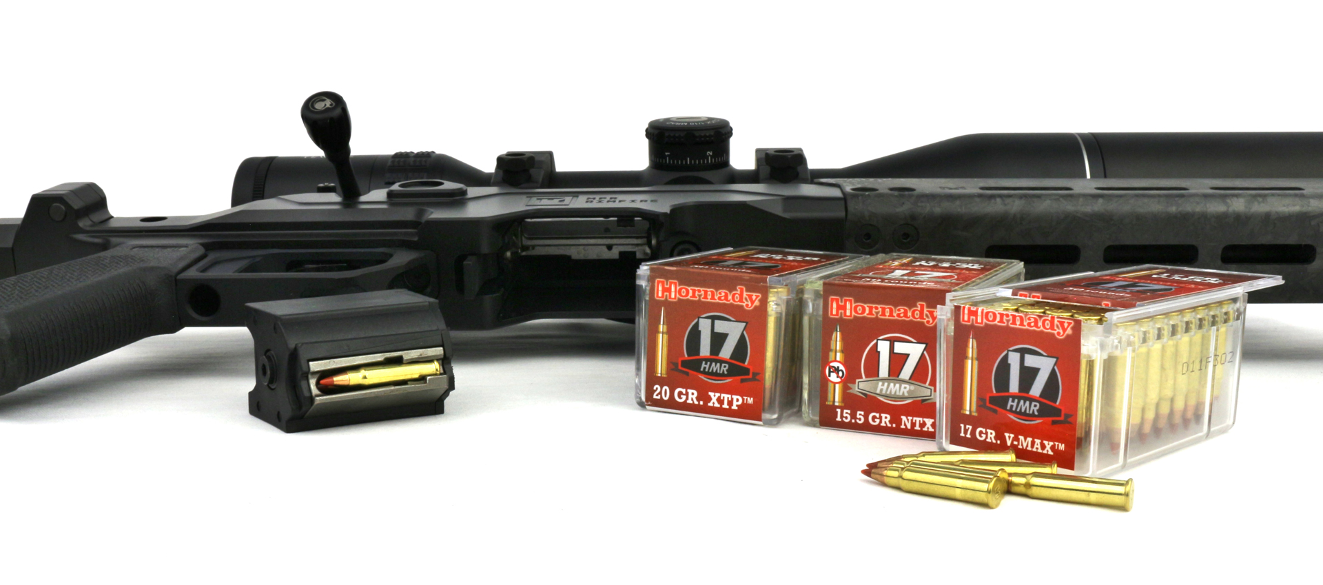 Christensen Arms Precision Rimfire rifle shown with hornady .17 hmr ammunition in magazine clip and boxes