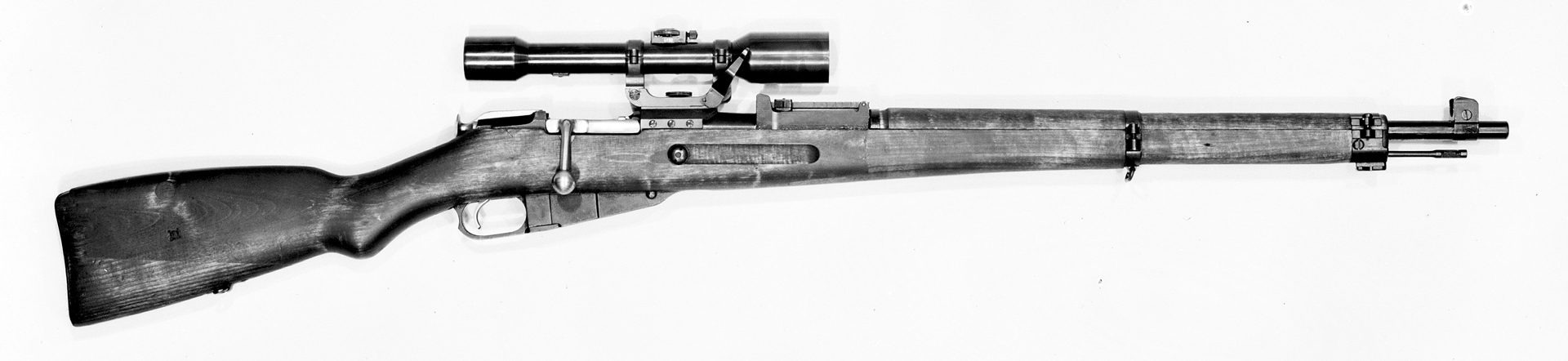 The Finnish M/33 sniper rifle fitted with a Zeiss 4X scope.  The M/33 used a special, curved 5-round stripper clip that could be used with the large scope fitted.  Photo courtesy of Finnish Wartime Photographic Archive, SA-kuva.