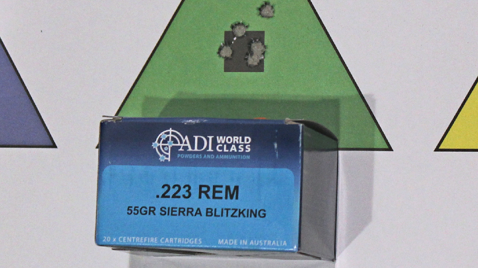 adi world class ammunition .223 REM box shown with green triangle and accuracy group