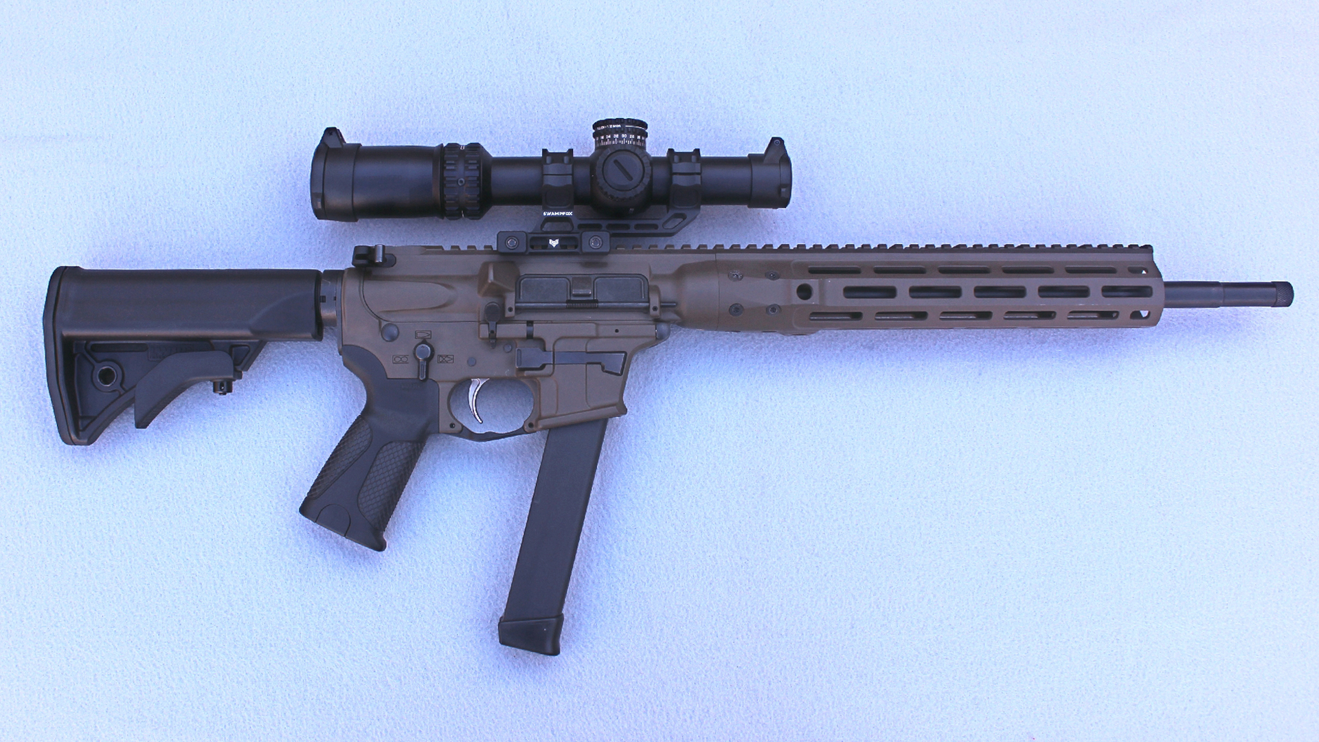 LWRCI IC 9 Carbine right-side view Patriot Brown Cerakote finish shown with Swamp Fox Arrowhead LPVO optic