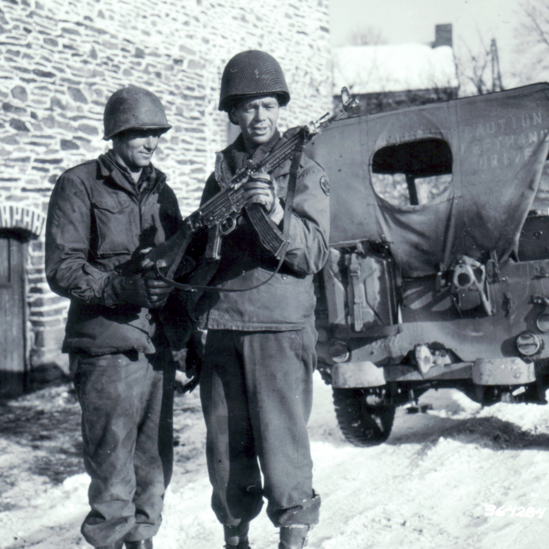 Men of the 101st Airborne inspect a captured StG44 at Monaville, Belgium during January 1945. Photo courtesy of National Archives & Records Administration (NARA).