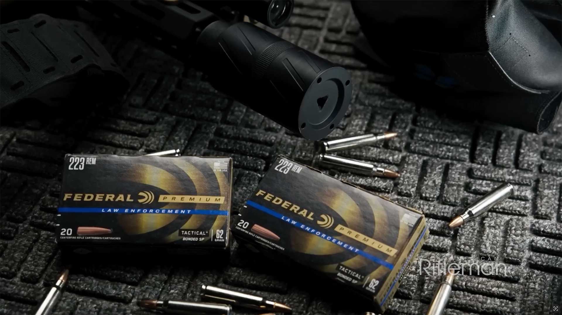 Silencer Central Banish Speed K suppressor next to two boxes of Federal Premium ammunition.