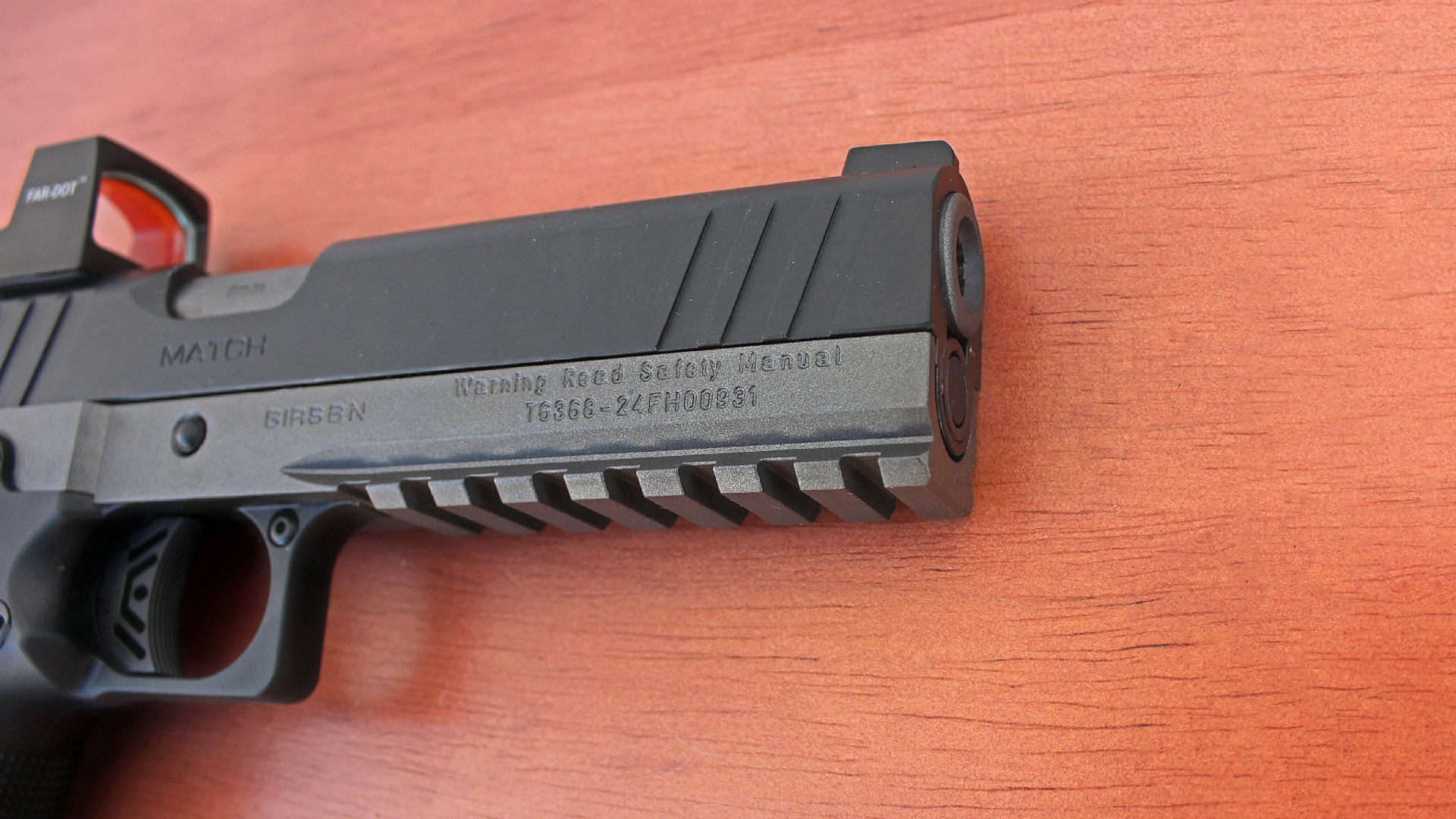 EAA Corp Girsan Witness2311S Match pistol gun 9 mm closeup barrel slide muzzle Picatinny rail underside on gray frame