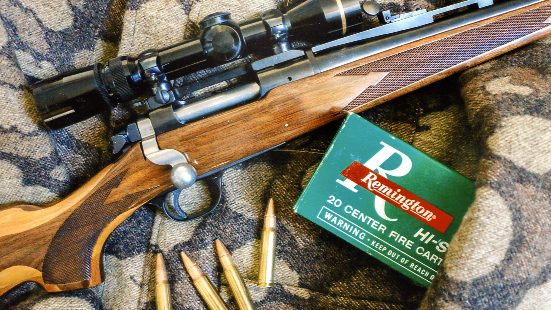 Remington Model 600 bolt-action rifle with leupold riflescope and remington ammunition