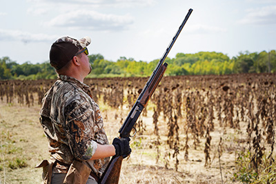 Hunter in the field with Browning’s A5 Hunter 20 Gauge