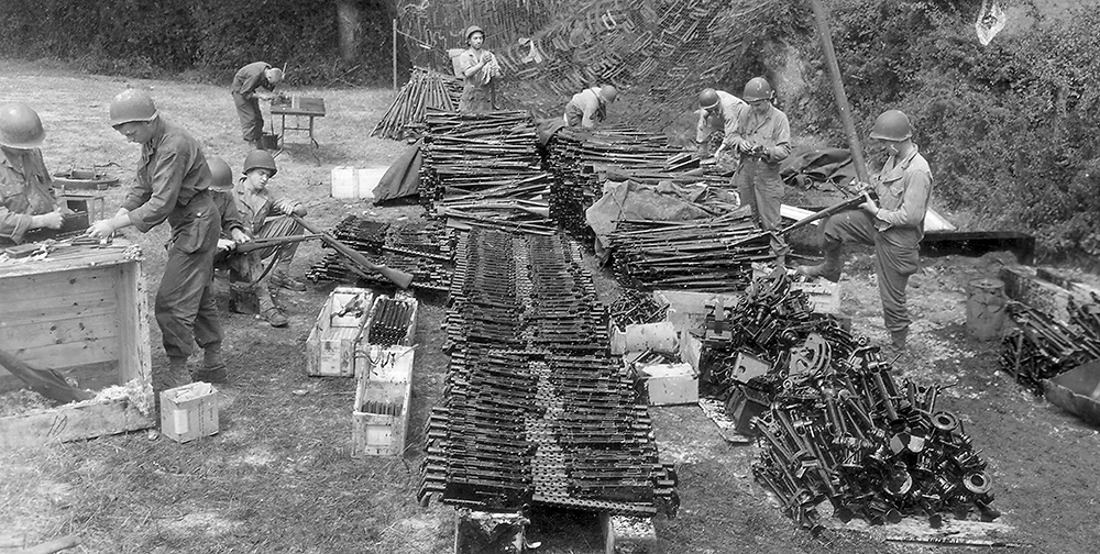 116 M1919A4 machine guns lined up for servicing