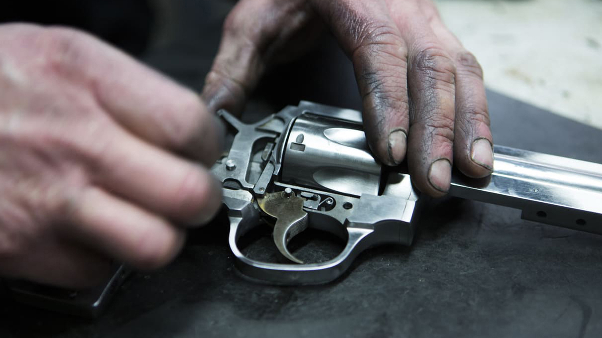 MR73 revolver being fitted for parts by hand