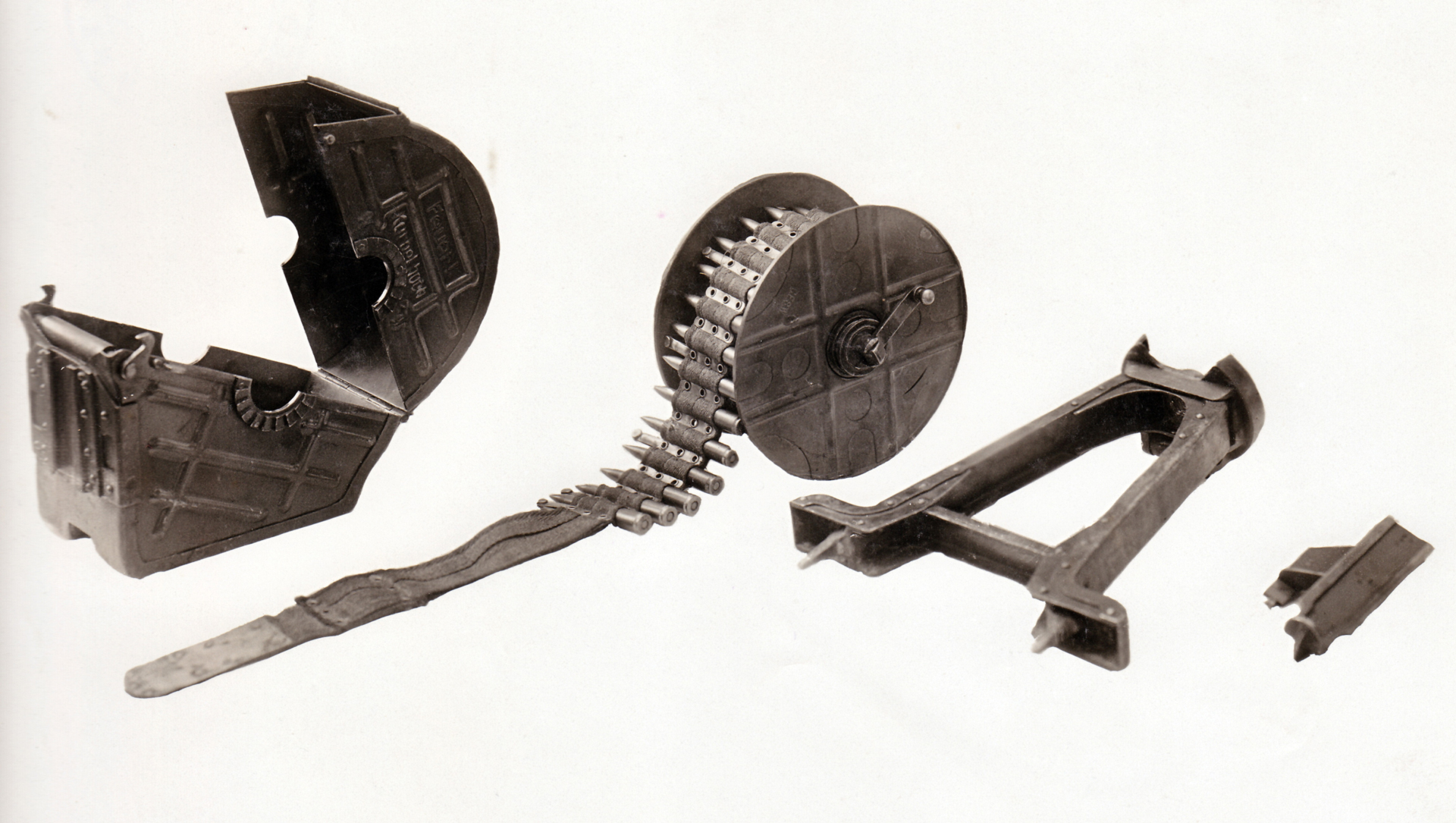 Details of the ammunition belt drum (showing the internal spool) and the simple bipod of the MG08/15. The Patronenkasten 16 was intended to allow the MG08/15 to be operated by one man—at least as long as 100 rounds of ammunition lasted.  NARA