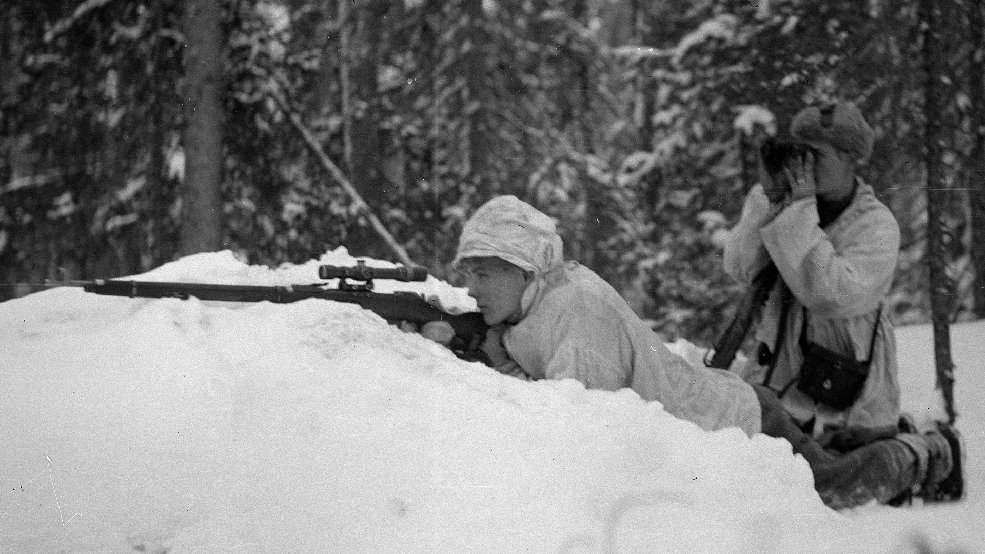 A Finnish sniper team at work.  The rifle is a captured Soviet M/91-30 with a PE scope.  Photo courtesy of Finnish Wartime Photographic Archive, SA-kuva.