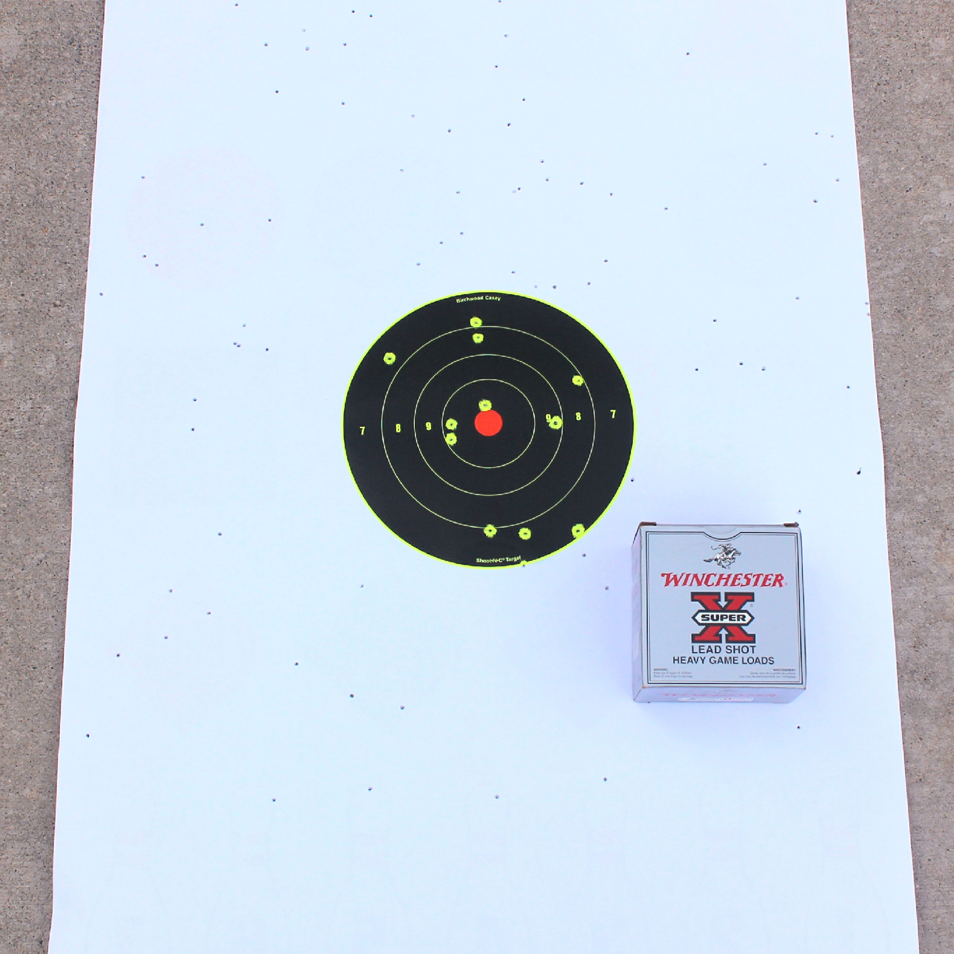 Heritage Badlander ammunition testing white target with black bullseye and ammunition box