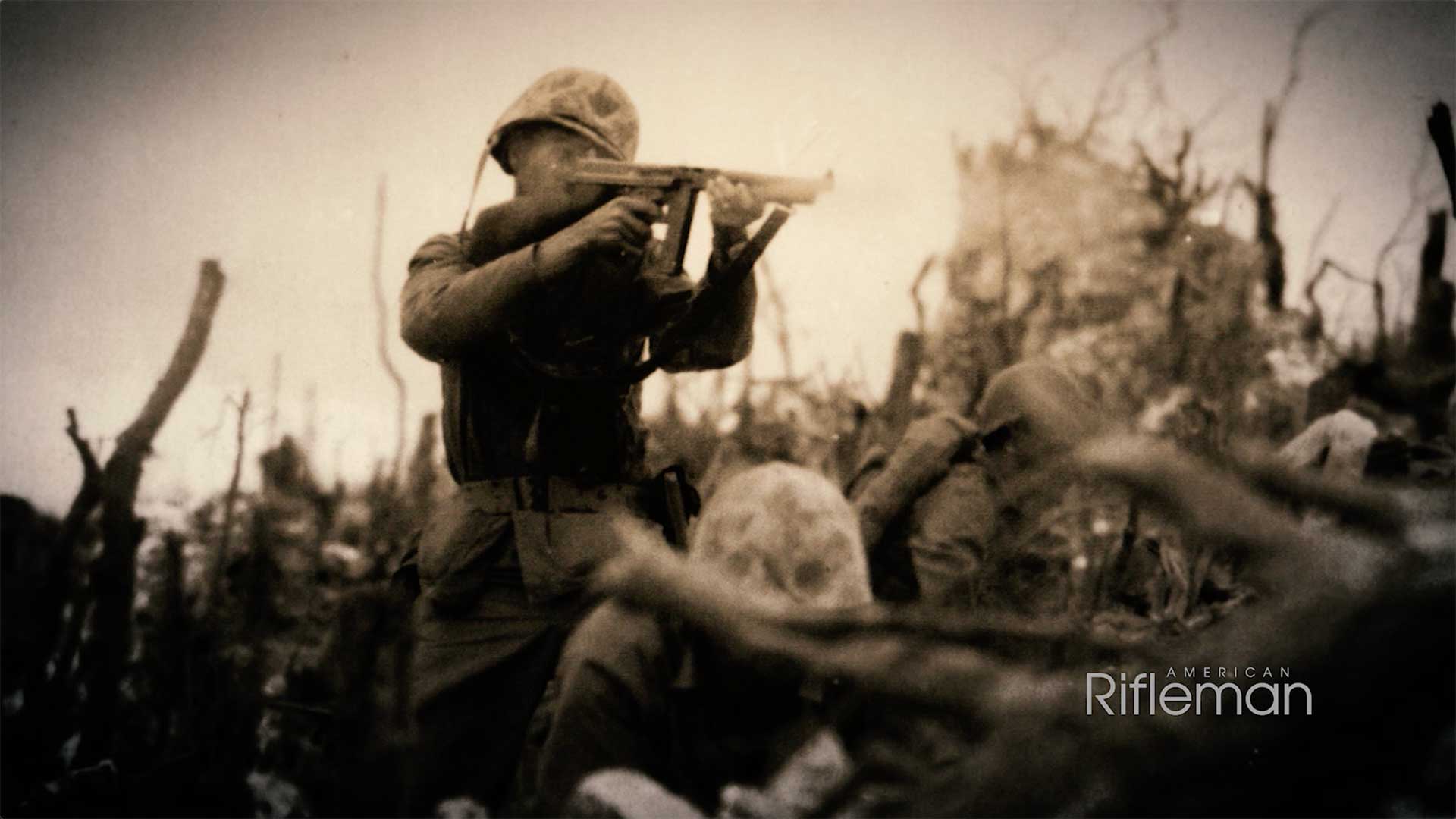 A World War II Marine fires a Thompson submachine gun during combat in the South Pacific.