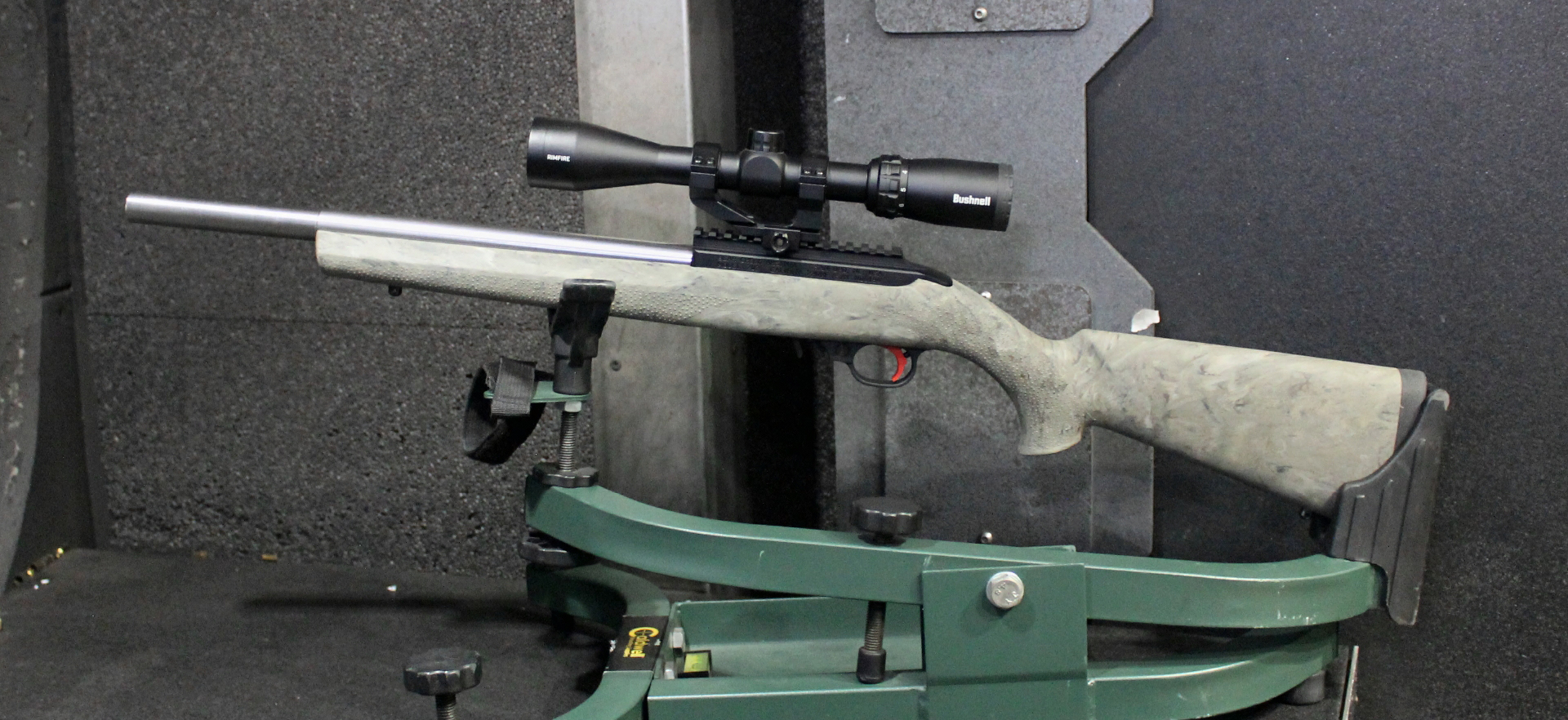 Bear Creek Arsenal BC-202 semi-automatic rifle with bushnell riflescope in a rest indoor shooting range.