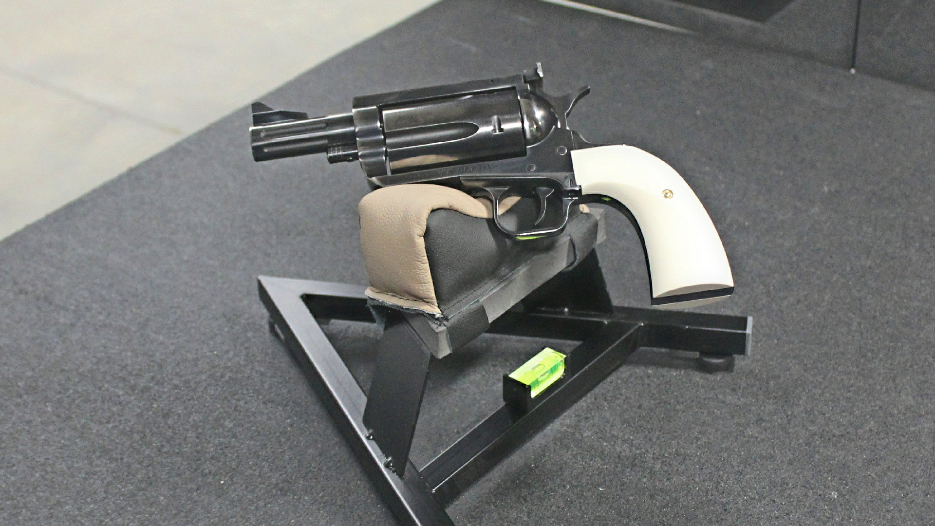 Magnum Research revolver BFR thunder buggy custom gun in hyskore a-frame shooting rest on shooting range table