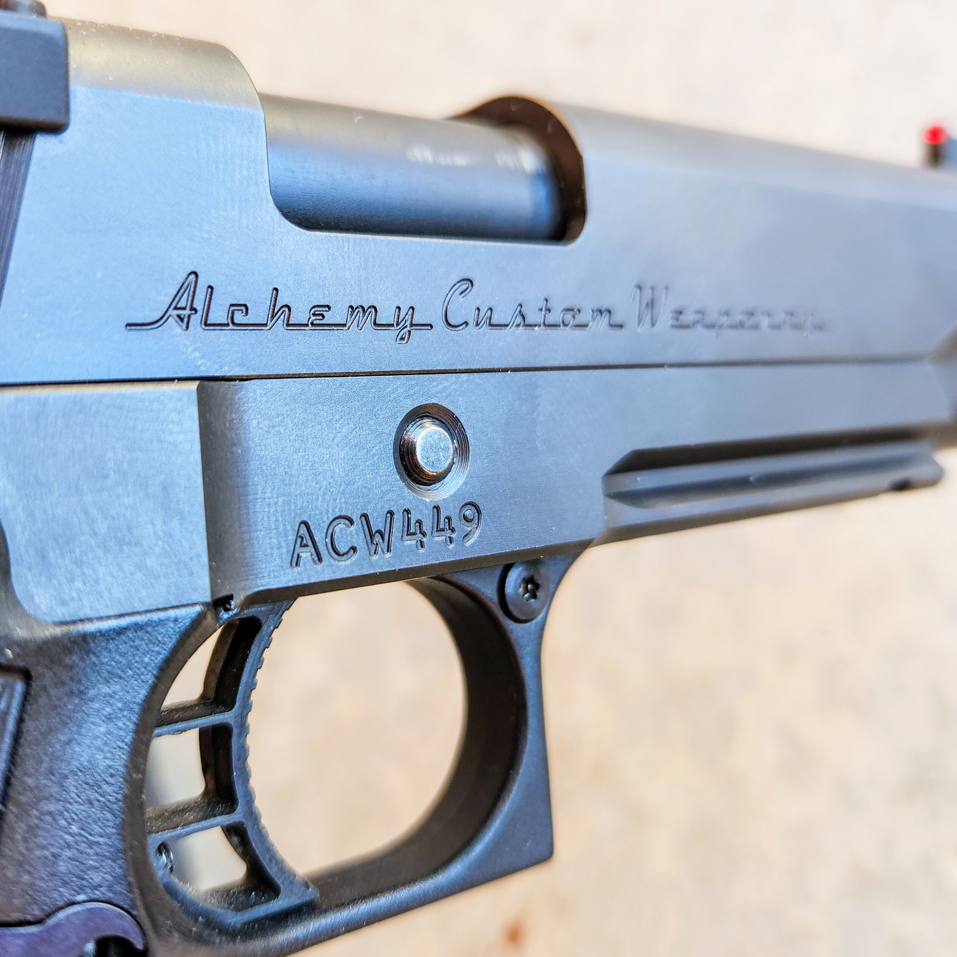 Alchemy Custom Weaponry Quantico HiCap pistol right-side view slide stamping