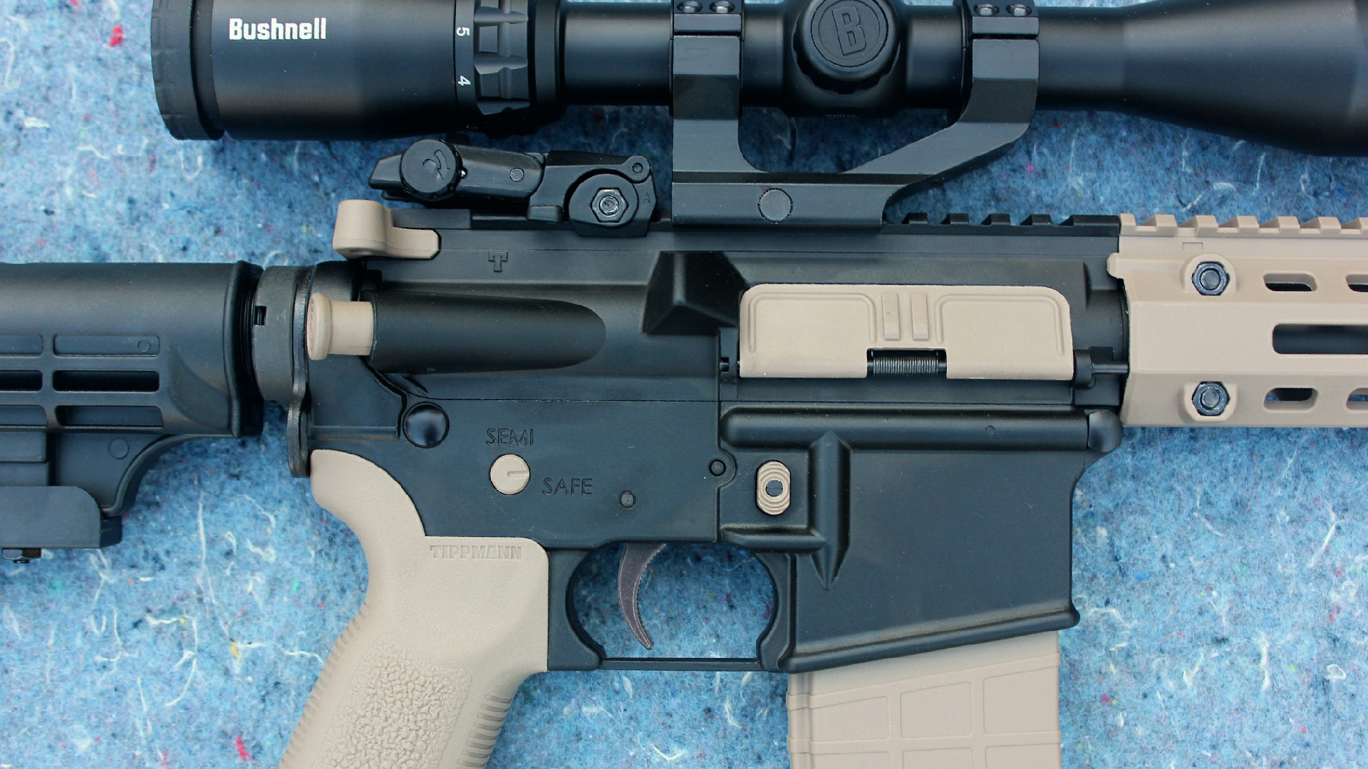 Tippmann M4-22 LTE right-side view rifle receiver controls shown with bushnell riflescope attached