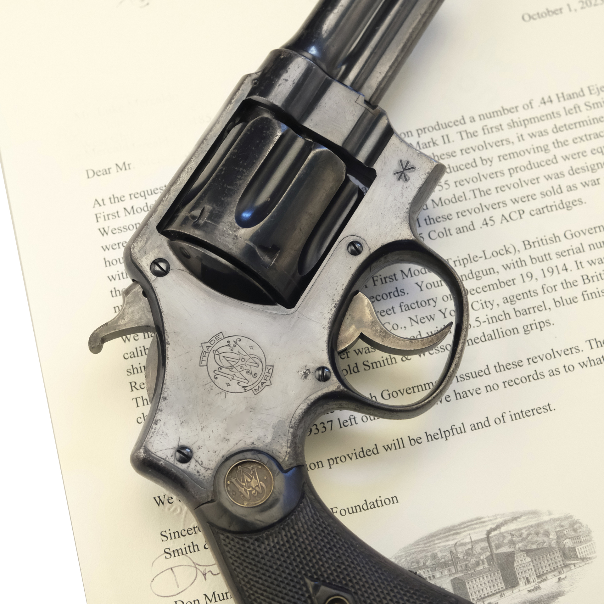 Smith & Wesson revolver right-side view on factory letter regarding historical specifics of aforementioned revolver