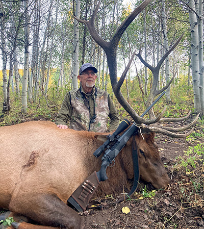 author with bull elk