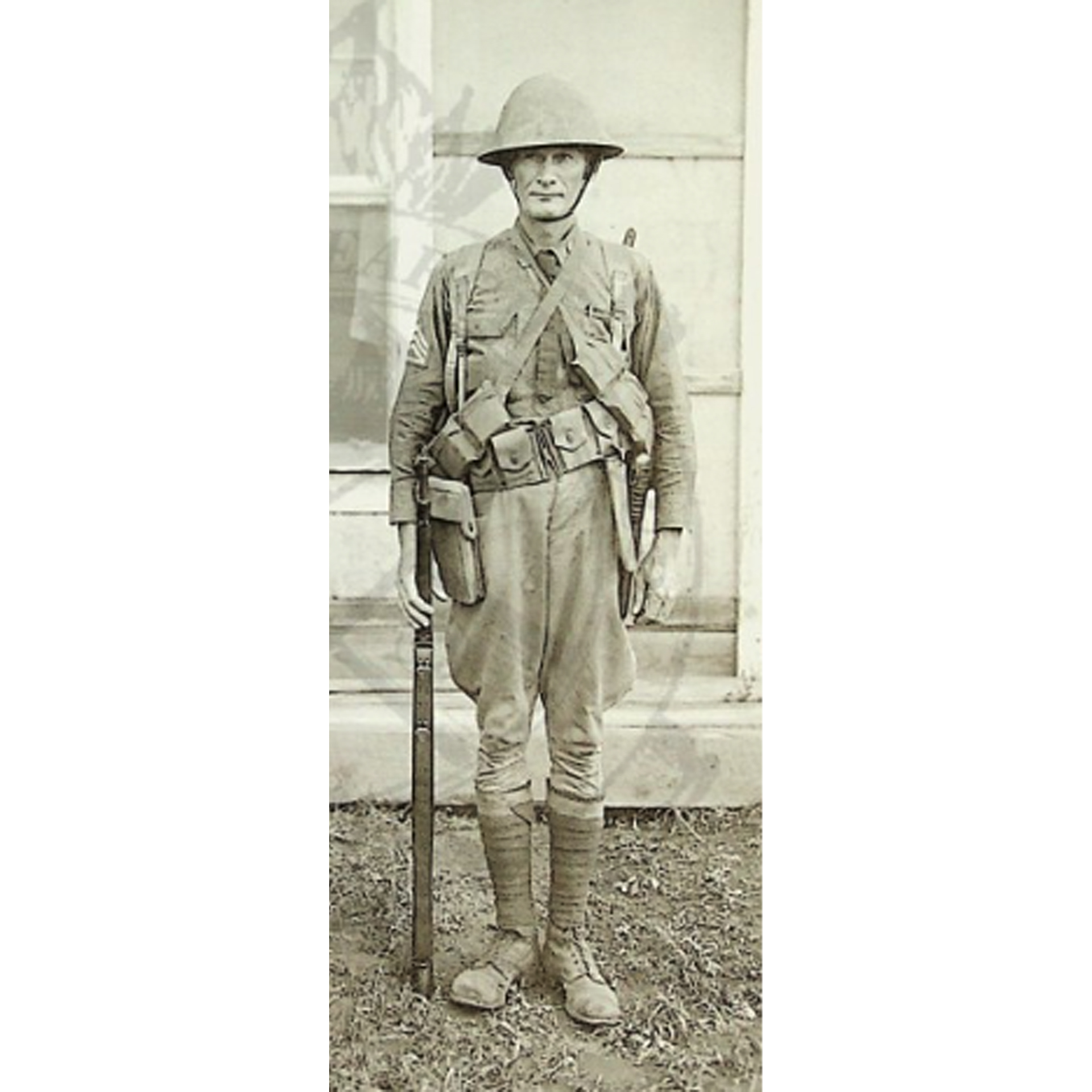 A 1920s NCO from the Department of Experiment at Fort Benning demonstrates the proper wear of the Pedersen Device equipment, alongside a standard battle load of equipment and ammunition. The two cloth bandoleers contain a total of 120 rounds of .30-06 on stripper clips, while his cartridge belt would hold 100. On his right hip, and obviously weighing down the belt, is the web magazine pouch holding 5 Pedersen magazines, with a total of 200 rounds of .30 pistol ammunition. On his left hip is both the web bolt pouch and the Pedersen Device in its scabbard. Interestingly he is also sporting a "Liberty Bell" experimental helmet, and appears to be using a m1910 wire cutter pouch in lieu of the purpose built bolt pouch.