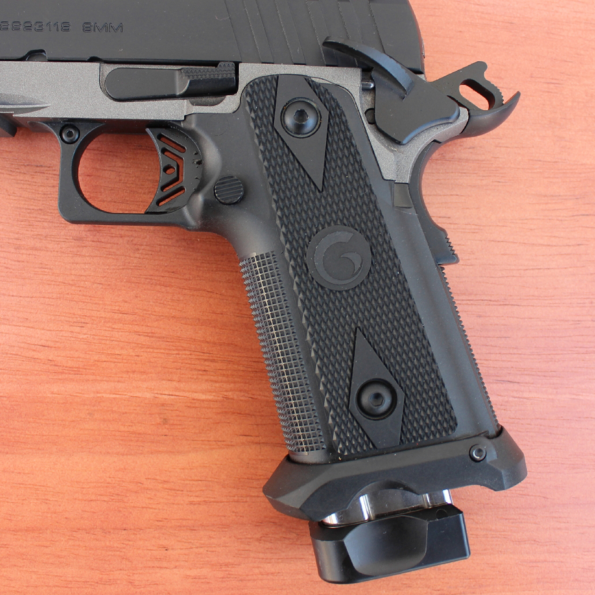 EAA Corp Girsan Witness2311S Match grip frame checkering black polymer left-side view showing controls.