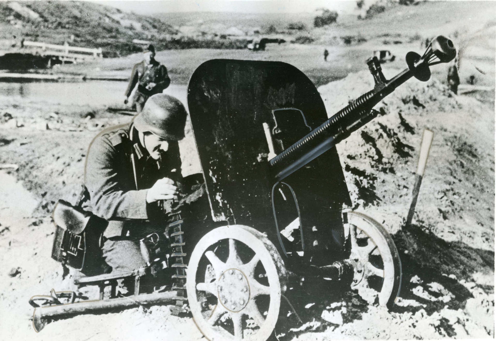 4)	A DShK captured by German troops during the 1941 invasion of the Soviet Union.  The wheeled mount with an armored shield for infantry use weighed 346 pounds.  This was the least common configuration of the weapon in WWII.