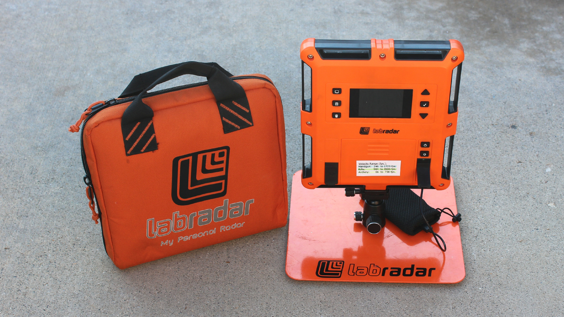 Labradar chronograph shown with orange bag orange square machine on orange stand