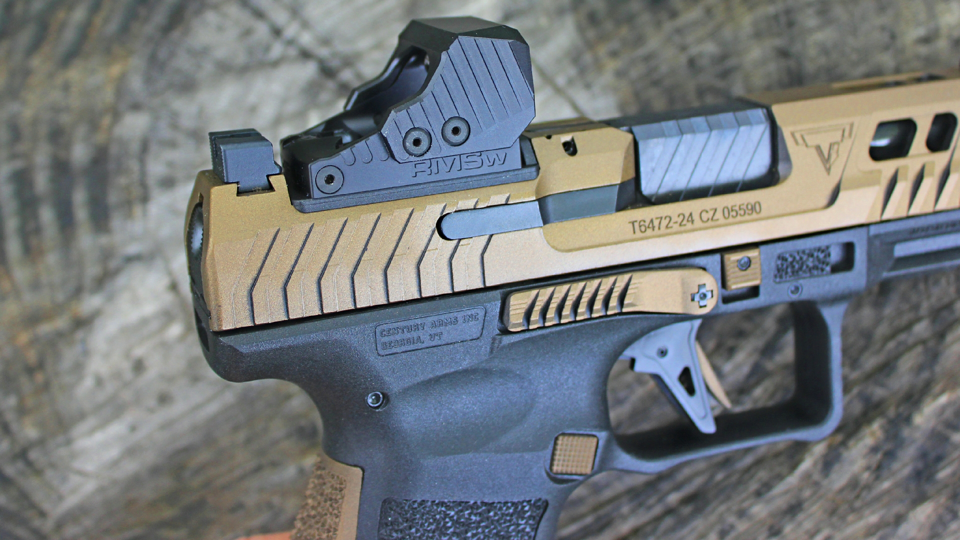 Canik TTI Combat 9 mm pistol closeup detail slide cuts serrations