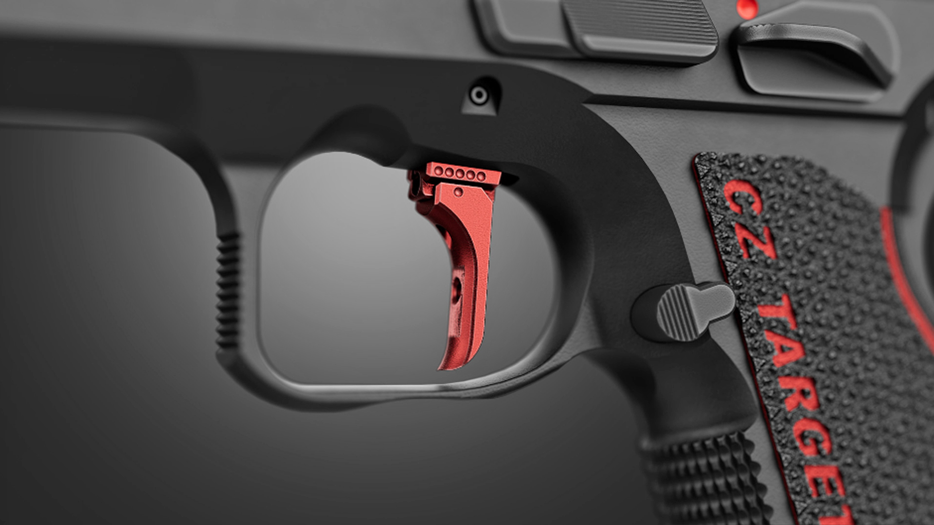 Red trigger inside the black CZ Shadow 2 Target's trigger guard.