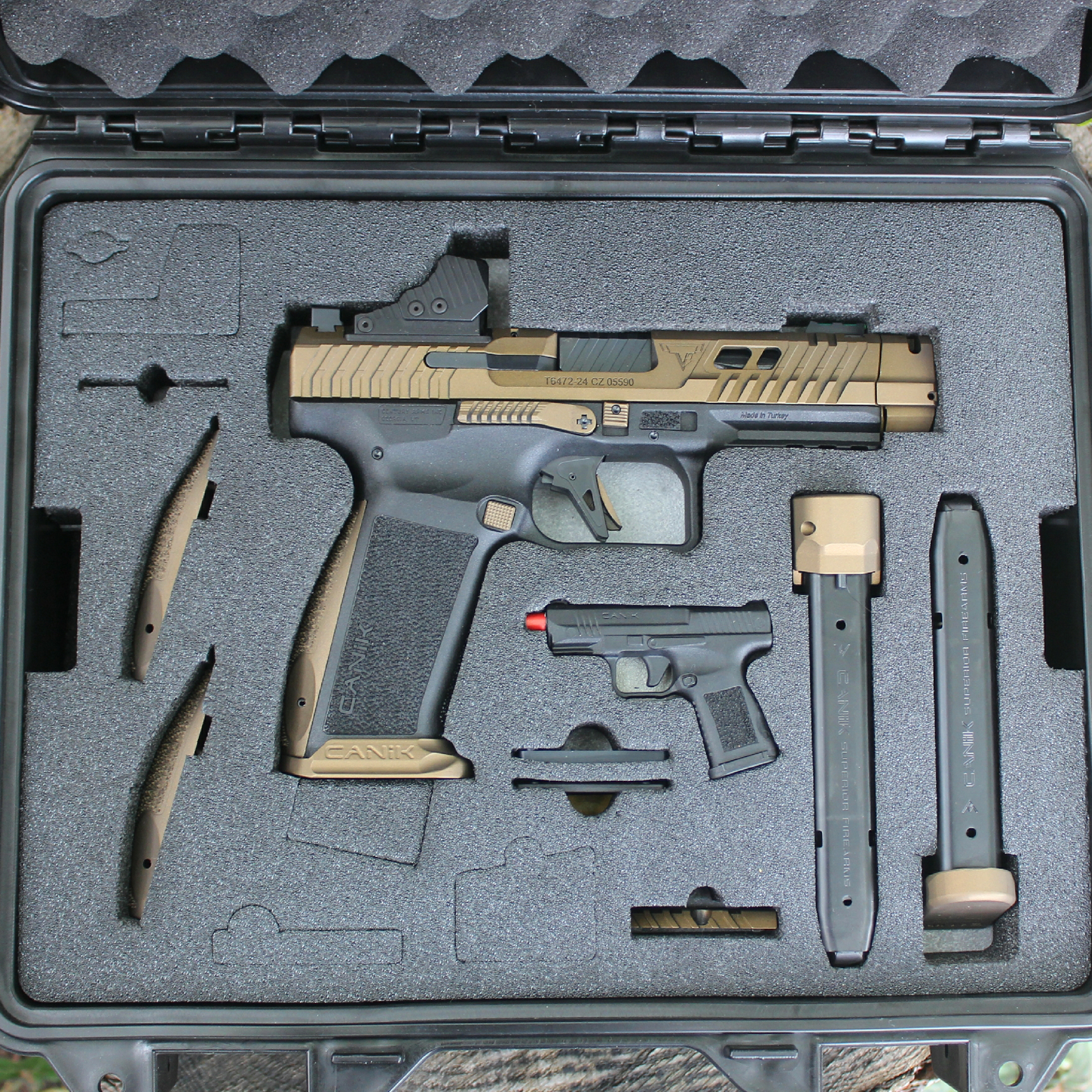 Century Arms Canik TTI Combat 9 mm pistol shown in case with accessories