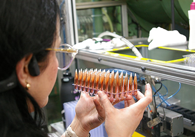 Hornady employee visually inspects A-Tip bullets