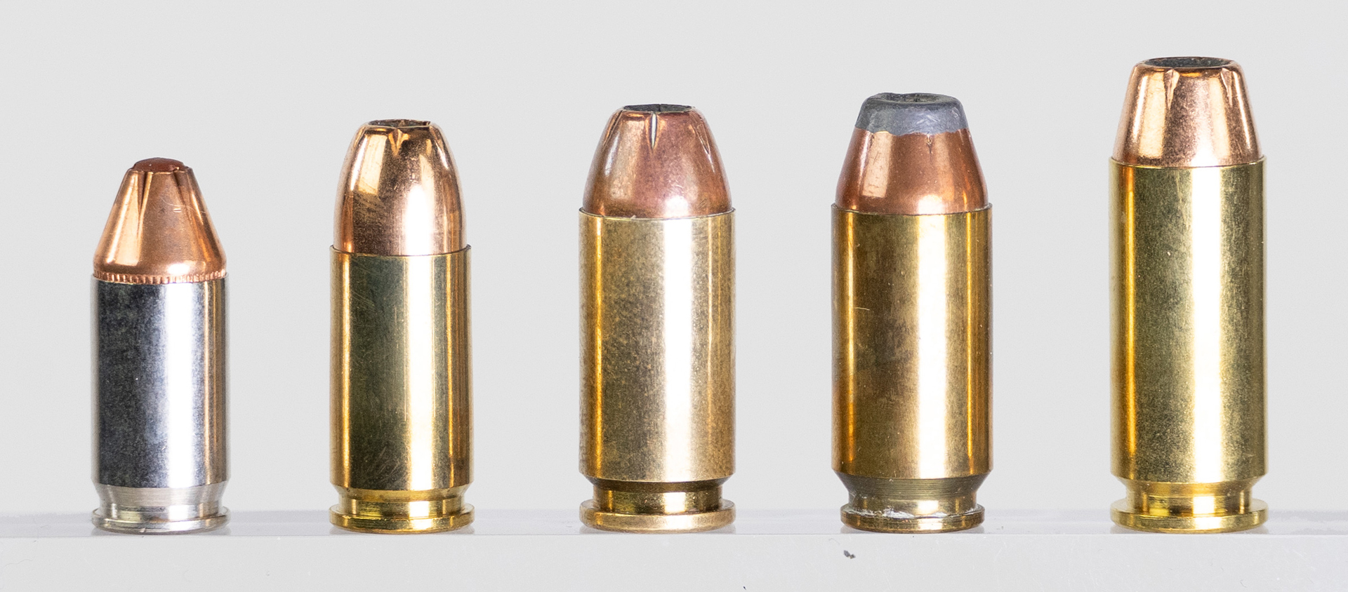 Ammunition lineup picket fence .380 ACP, 9 mm Luger, .40 S&W, .41 Action Express, 10 mm Auto