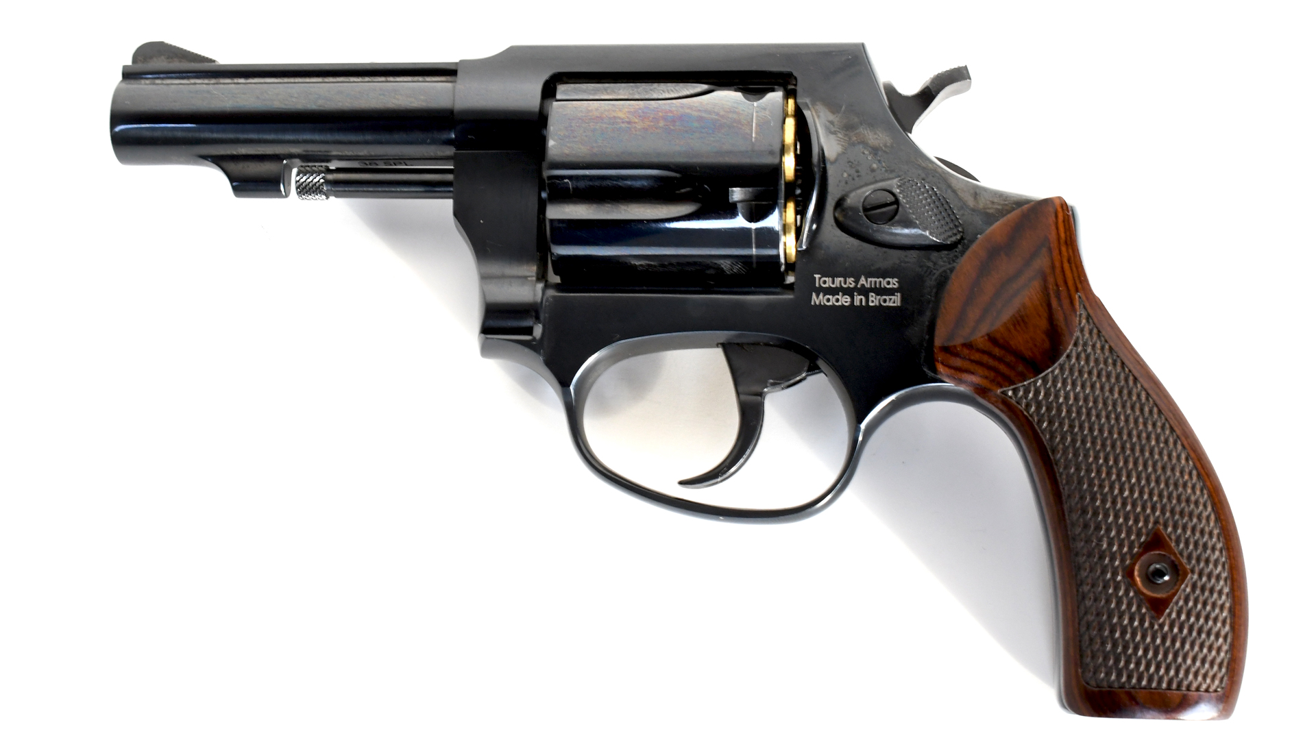 Heritage Manufacturing Roscoe double-action revolver left-side view on white black metal wood stocks classic style snub-nose gun