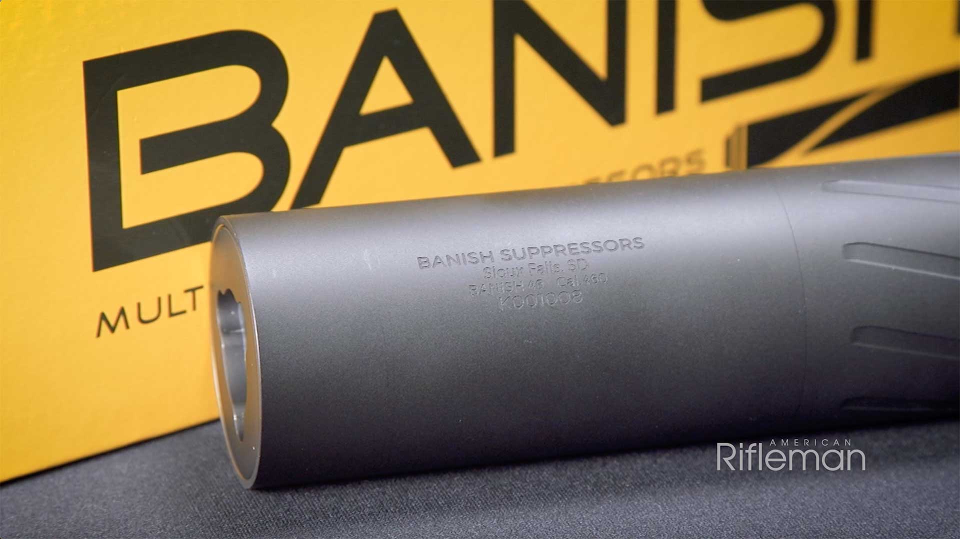 The front portion of a Silencer Central Banish 46 suppressor shown in front of a yellow box.