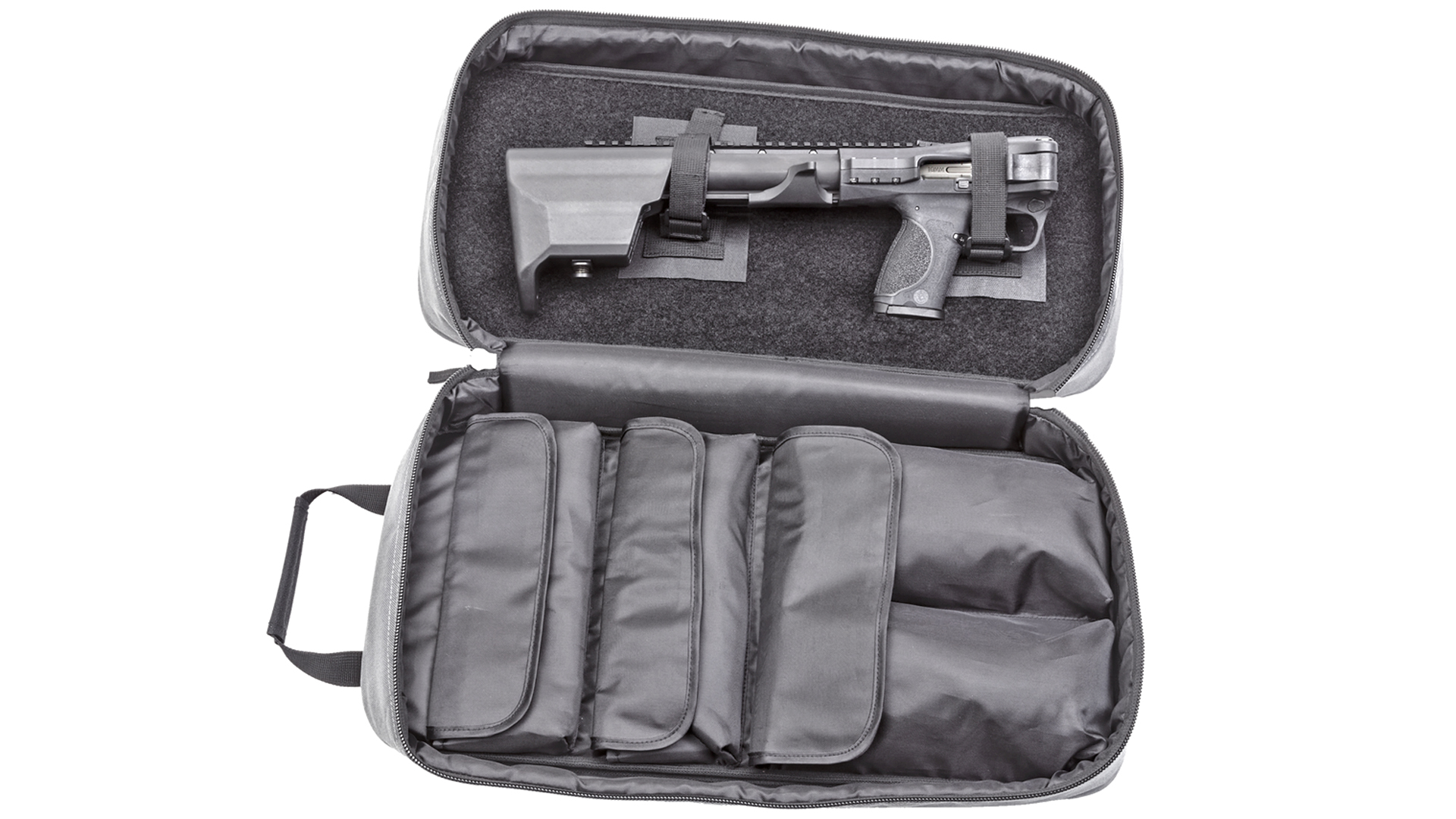 A folded Smith & Wesson FPC 10 mm Auto inside of a carrying case.