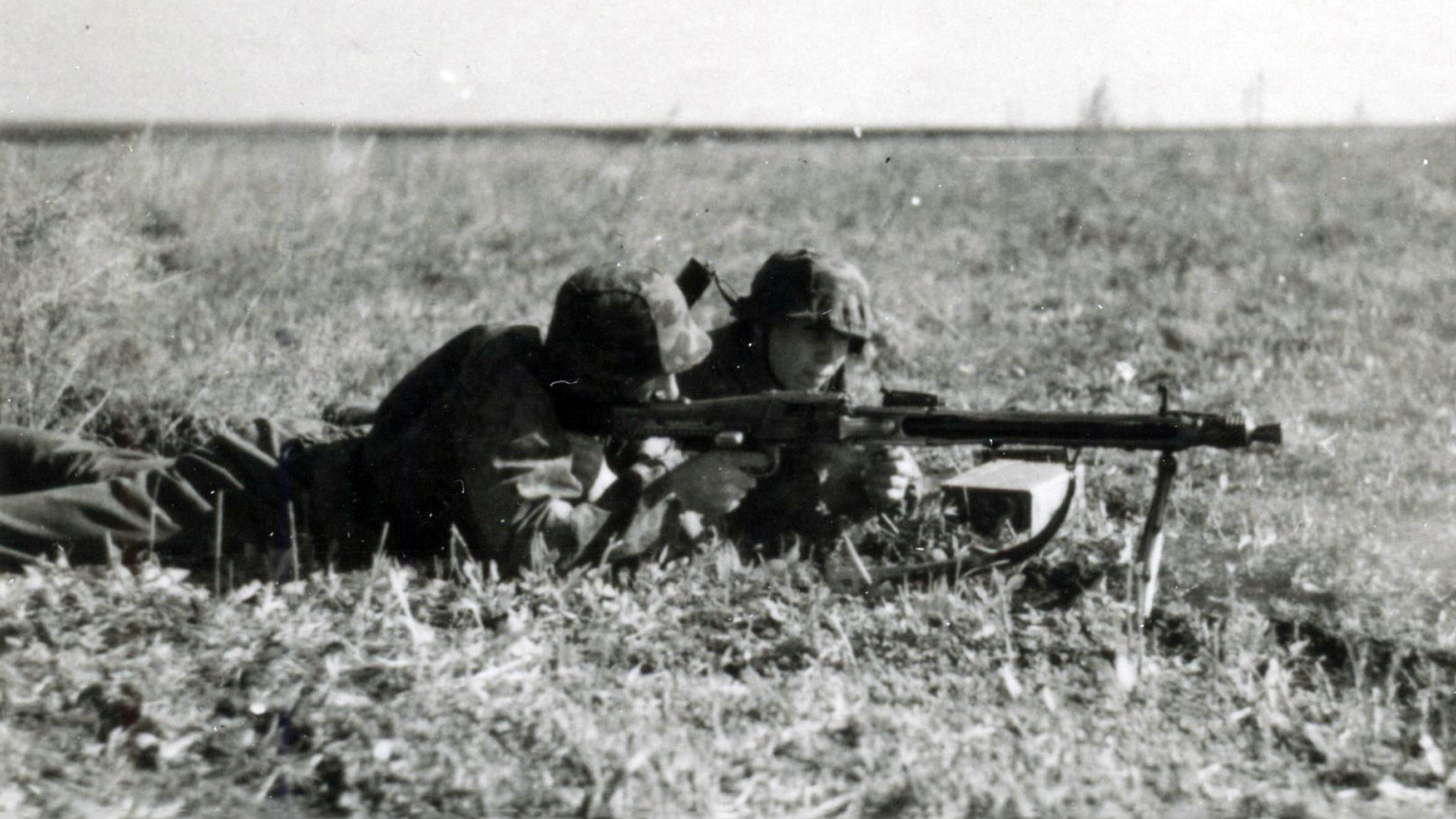 MG 42 shown with men in field prone position