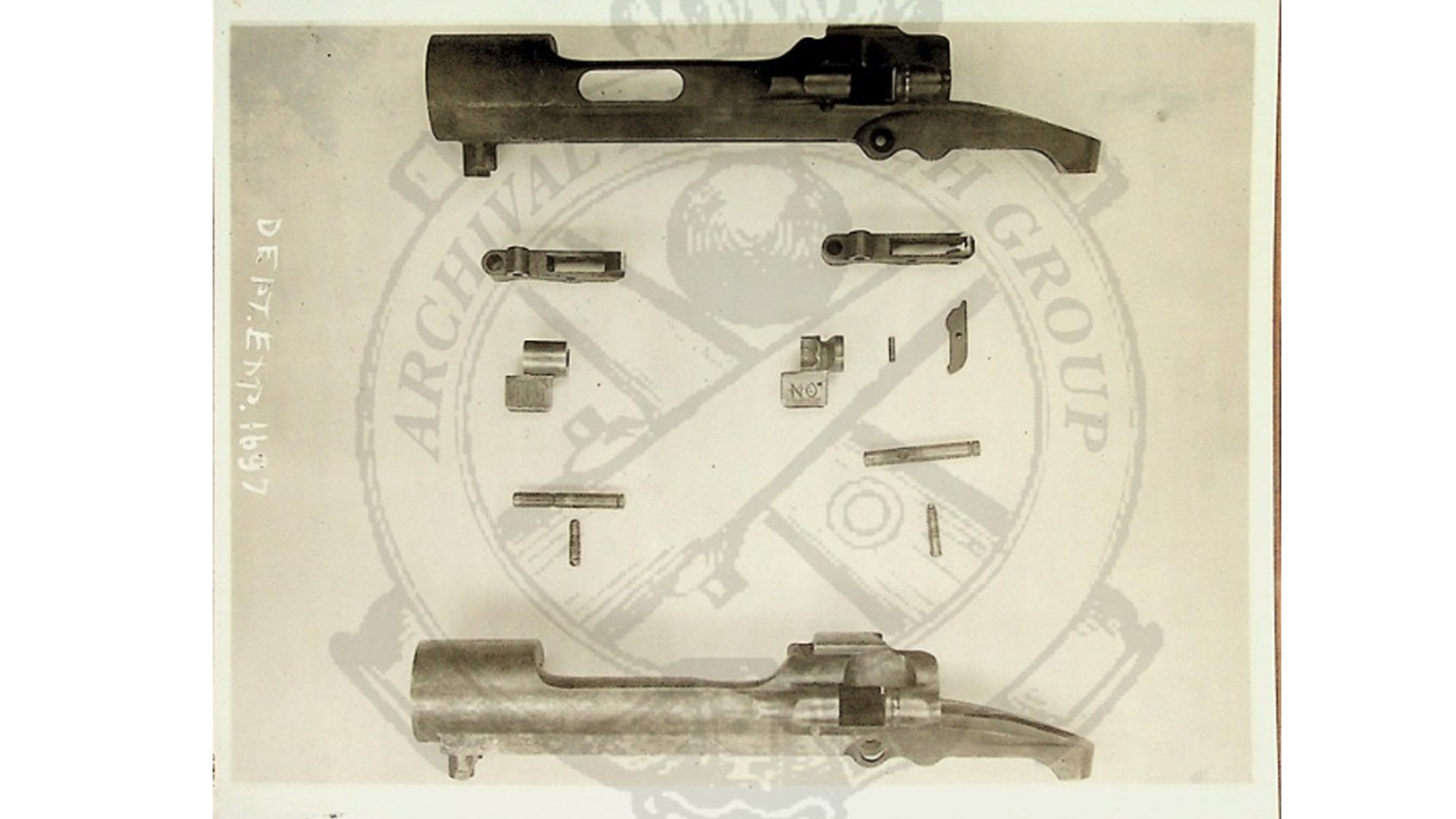 Besides the receiver, other small parts needed to be modified from the standard M1903, or added entirely, in order to ensure the Pedersen Device fit and functioned. The top receiver, and small parts on the right, are for use in a M1903 Mark I rifle.