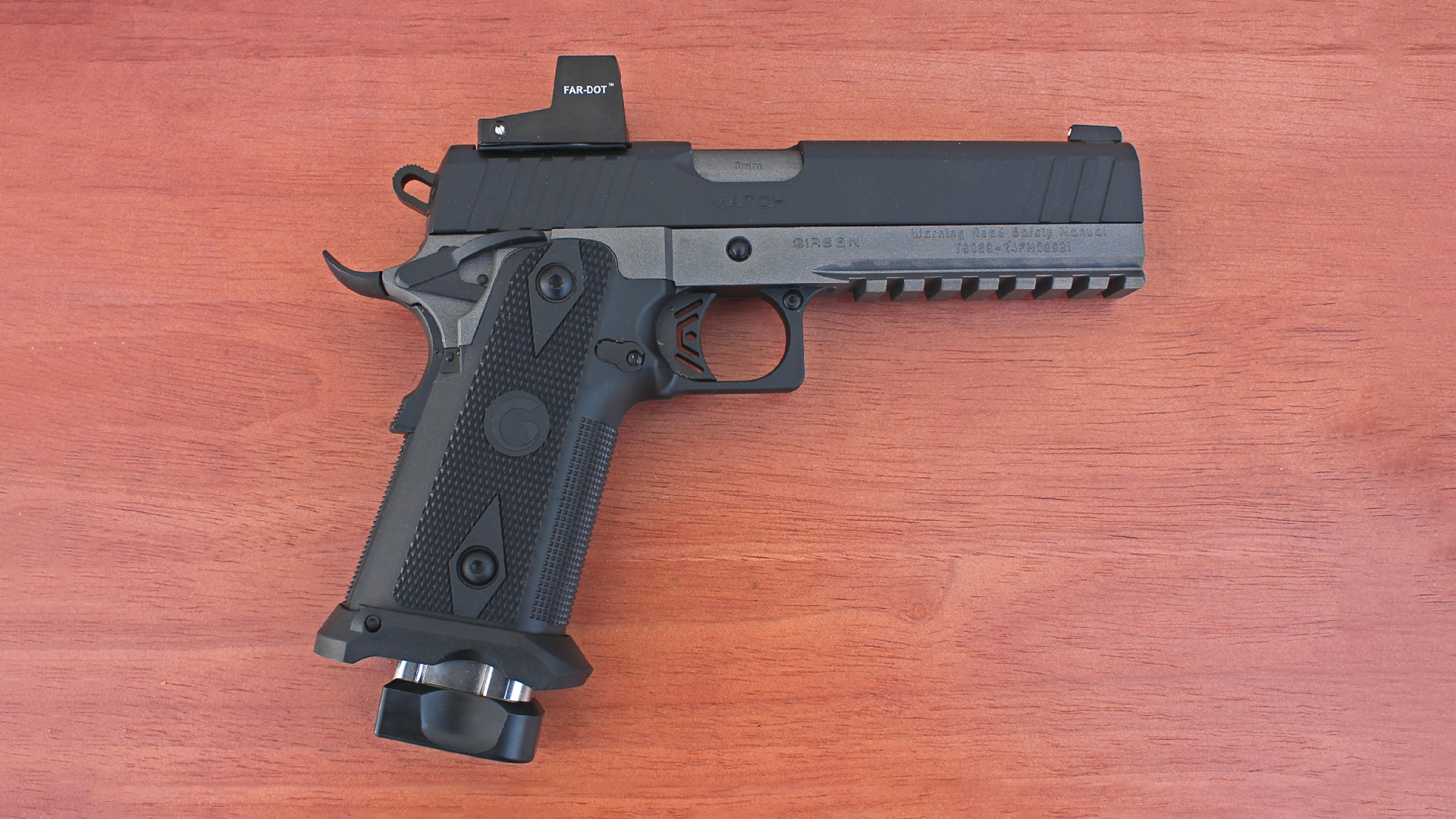 EAA Corp Girsan Witness2311S Match 9 MM pistol left-side view two-tone color black slide gray frame black polymer grip shown on wood table