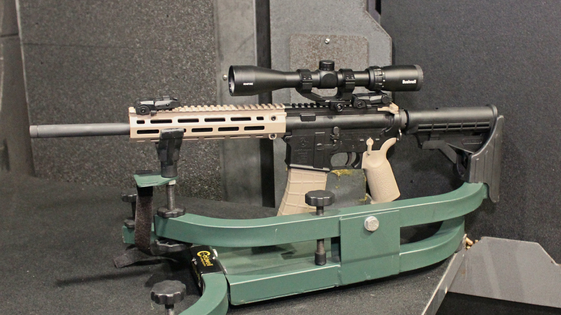 Tippmann M4-22 LTE in rifle rest on shooting table indoor range