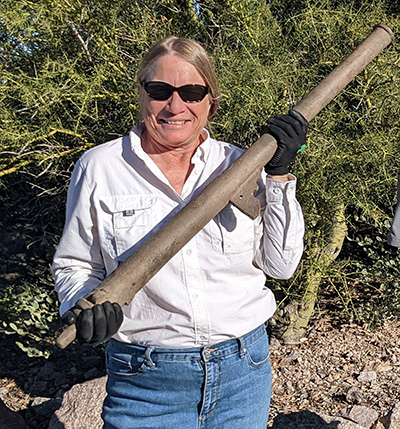 archaeologist Deni Seymour with cannon