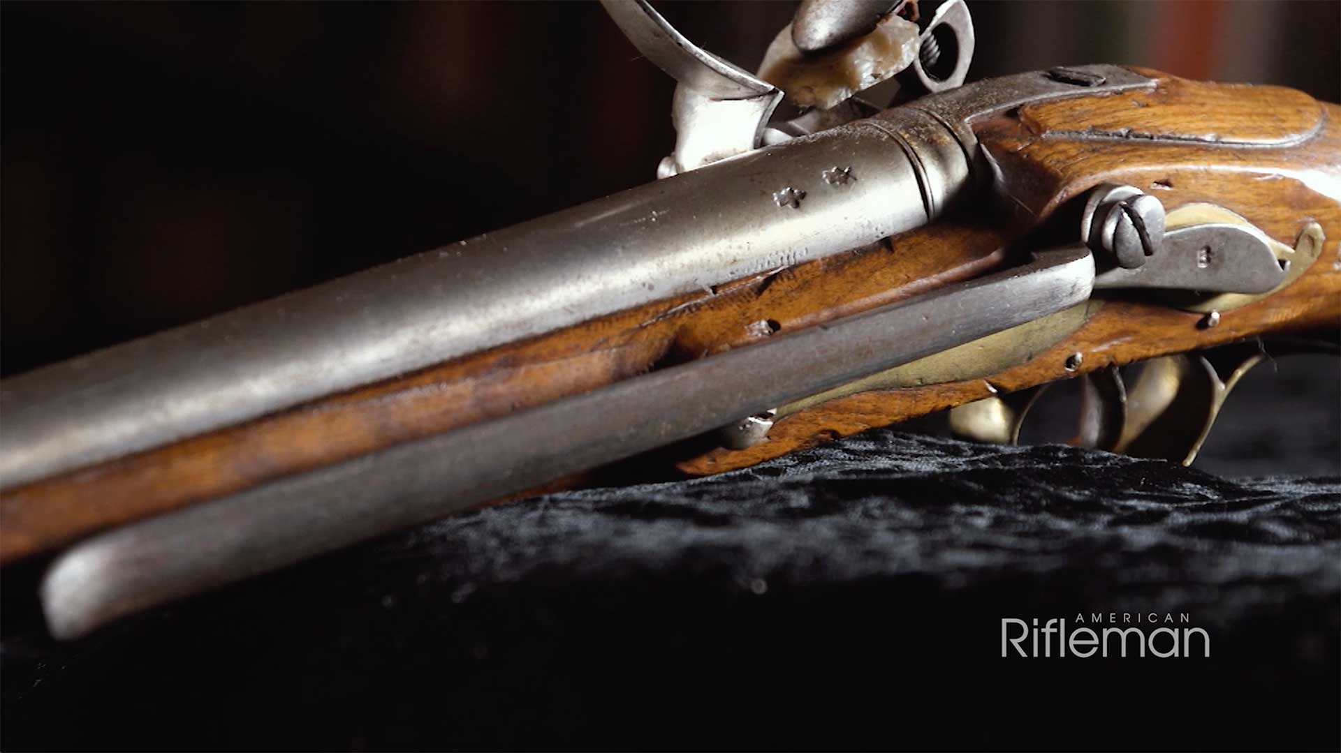 Belt hook on the left side of a British Pattern 1801 Sea Service Pistol.