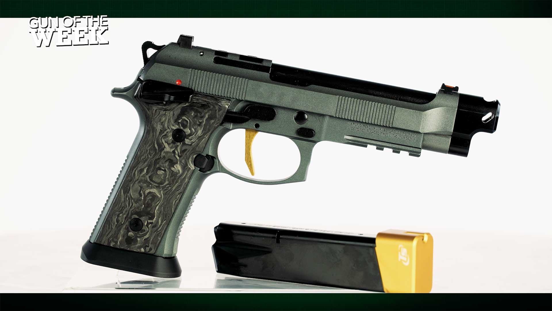 Right side of the silver-colored Beretta 92XI Corsa, with gray and gold accents.