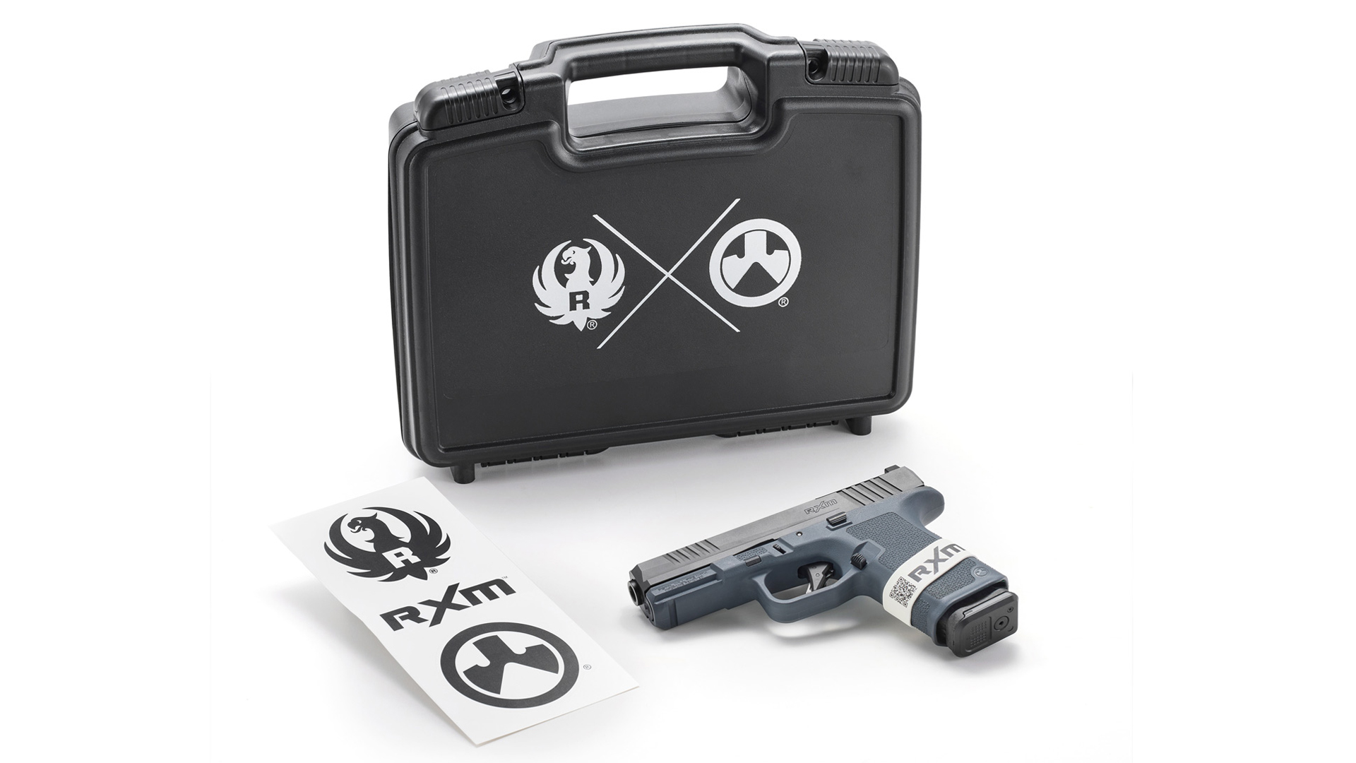 Black carrying case next to a Ruger RXM pistol.