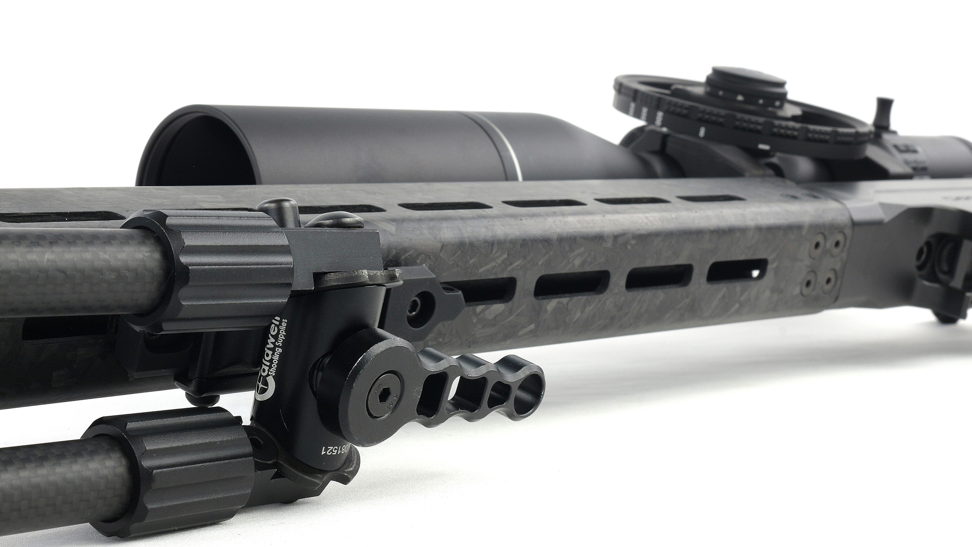 Christensen Precision Rimfire rifle chassis fore-end carbon fiber shown with caldwell bipod and hawke optic